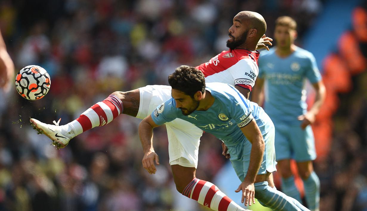 Alexandre Lacazette. Striker berusia 30 tahun ini didatangkan Arsenal pada 2017/2018 dengan nilai 53 juta euro usai tampil impresif dalam 8 musim bersama Lyon dengan mencetak 129 gol dari 275 laga. Bersama The Gunners hingga awal musim ini telah mencetak 66 gol dari 172 laga. (AFP/Oli Scarff)