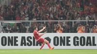 Gaya pemain Persija Jakarta, Marko Simic merayakan gol ke gawang Tampines Rovers pada laga Piala AFC 2018 di Stadion Utama GBK, Senayan, Jakarta (28/2/2018). Simic mencetak tiga gol untuk Persija. (Bola.com/Nick Hanoatubun)