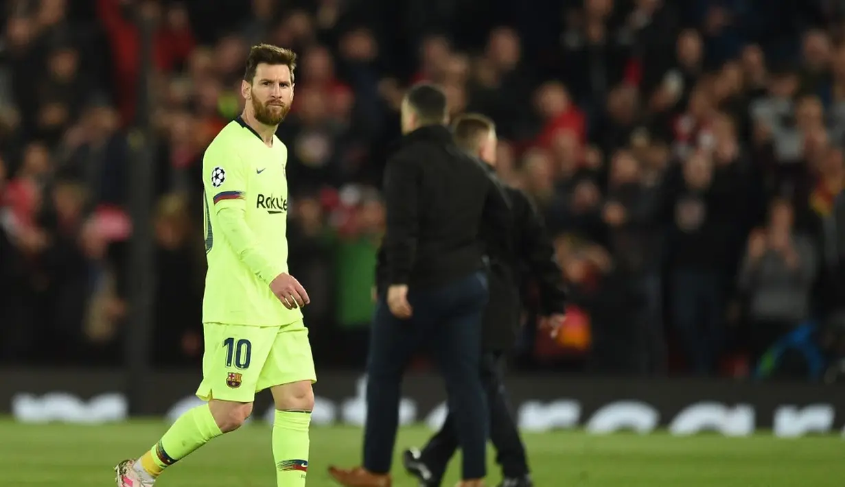 1. Lionel Messi (Barcelona) - 12 gol dan 3 assist (AFP/Oli Scarff)