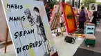 Sejumlah seniman lukis menumpahkan imajinasinya terkait "Korupsi" untuk dijadikan sebuah karya seni, di lobby Gedung Merah Putih Komisi Pemberantasan Korupsi (KPK), Jakarta, Senin (9/12/2024). (Liputan6.com/Herman Zakharia)