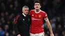 Harry Maguire merupakan kapten sekaligus pemain yang sulit digantikan di Manchester United asuhan Ole Gunnar Solskjaer. Ia tercatat bermain selama 876 menit dengan menorehkan 1,3 tackling per laga, 0,7 intersep, 3,5 sapuan, dan 0,6 pelanggaran, serta memenangkan 24 kali duel udara. (AFP/Glyn Kirk)