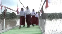 Puluhan Tahun Andalkan Getek, Warga Pringsewu Kini Punya Jembatan Penyeberangan