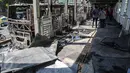 Kondisi Halte UI Salemba yang ikut terbakar bersama dengan Bus gandeng Transjakarta koridor V Ancol - Kampung Melayu pagi tadi, Jakarta, Jumat (7/3/2015). Akibat kebakaran tersebut, Halte UI Salemba rusak ringan. (Liputan6.com/Faizal Fanani)