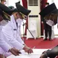 Gubernur Sulawesi Selatan, Nurdin Abdullah melantik 11 bupati dan wali kota terpilih pemenang Pilkada serentak 9 Desember 2020. (Liputan6.com/Fauzan)