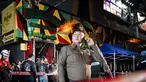 Polisi berjaga setelah kebakaran besar melanda sebuah bar di Bangkok, Thailand, Senin, 13 Juli 2026. (AFP/ Chanakarn Laosarakham)