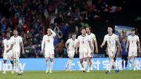 Para pemain Timnas Inggris tampak kecewa saat melawan Italia pada laga final Euro 2020 di Stadion Wembley, London, Senin (12/07/2021). (Foto: AP/Carl Recine,Pool)