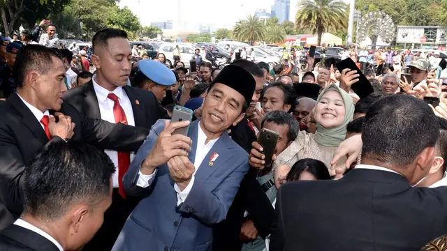 Presiden Joko Widodo atau Jokowi yang menggelar open house di Istana Negara, Rabu (6/5/2019)