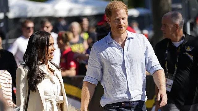 Pangeran Harry dan Meghan Markle. (AP Photo/Martin Meissner)