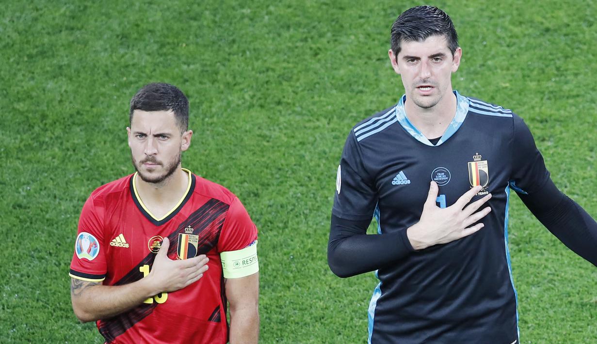 Eden Hazard dan Thibaut Courtious - Hazard dan Courtious merupakan dua pemain andalan dan tak tergantikan di Timnas Belgia. Kini dua mantan penggawa Chelsea itu juga sama-sama berseragam Real Madrid. (AFP/Anton Vaganov)
