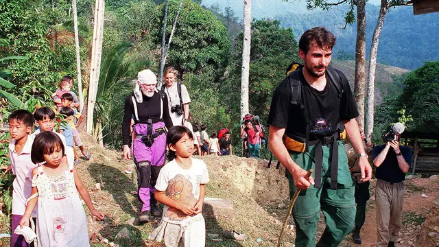Pendaki saat mendaki Gunung Kinabalu di Malaysia LISA ILEY / AFP