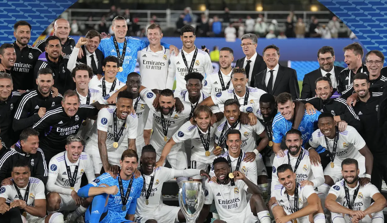 Para pemain Real Madrid merayakan dengan trofi setelah memenangkan pertandingan melawan Eintracht Frankfurt pada final Piala Super Eropa di Stadion Olimpiade Helsinki, Finlandia, Kamis (11/8/2022). Real Madrid menang atas Eintracht Frankfurt 2-0. (AP Photo /Antonio Calanni)