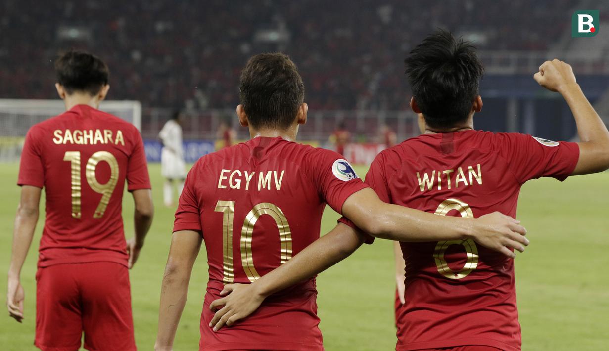 Gelandang Indonesia, Witan Sulaeman, melakukan selebrasi usai membobol gawang Uni Emirat Arab (UEA) pada laga AFC di SUGBK, Jakarta, Rabu (24/10/2018). Indonesia menang 1-0 atas UEA. (Bola.com/M Iqbal Ichsan)