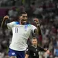 Pemain Inggris, Marcus Rashford merayakan gol&nbsp;ketiga timnya ke gawang Wales saat matchday ketiga Grup B Piala Dunia 2022 di Ahmad Bin Ali Stadium, Rabu (30/11/2022). (AP/Frank Augstein)