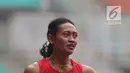 Atlet asal Bali, Dewi Ayu Agung Kurnia saat menyelesaikan lomba lari 400 meter putri senior Kejurnas Atletik U18, U20 dan Senior 2019 di Stadion Pakansari, Kab Bogor, Jumat (2/8/2019). Dewi Ayu Agung Kurnia meraih posisi pertama dengan catatan waktu 55,56 detik. (Liputan6.com/Helmi Fithriansyah)
