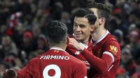 Gelandang serang Liverpool, Philippe Coutinho, merayakan gol yang dicetaknya ke gawang Swansea City pada pekan ke-20 Premier League 2017 di Anfield Stadium, Selasa (27/12/2017) dini hari WIB. (Peter Byrne/PA via AP)