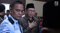 Menteri Agama, Lukman Hakim Syaifuddin memasuki ruang sidang Pengadilan Tipikor, Jakarta, Rabu (26/6/2019). Menag Lukman Hakim memberi keterangan sebagai saksi pada sidang lanjutan suap seleksi pengisian jabatan di Kementerian Agama. (Liputan6.com/Helmi Fithriansyah)