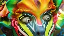 Ekspresi model dengan cat ultraviolet di wajahnya saat mengikuti Festival Bodypainting Dunia 2015 di Poertschach, Austria, (3/7/2015). Festival ini menampilkan beragam motif lukisan unik hasil karya para seniman terkemuka dunia. (Reuters/Heinz-Peter Bade)
