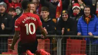 Marcus Rashford menyumbangkan satu gol sekaligus membawa Manchester United meraih kemenangan 2-1 atas Brighton and Hove Albion pada laga pekan ke-23 Premier League, di Old Trafford, Sabtu (19/1/2019). (AFP/Oli Scarff)