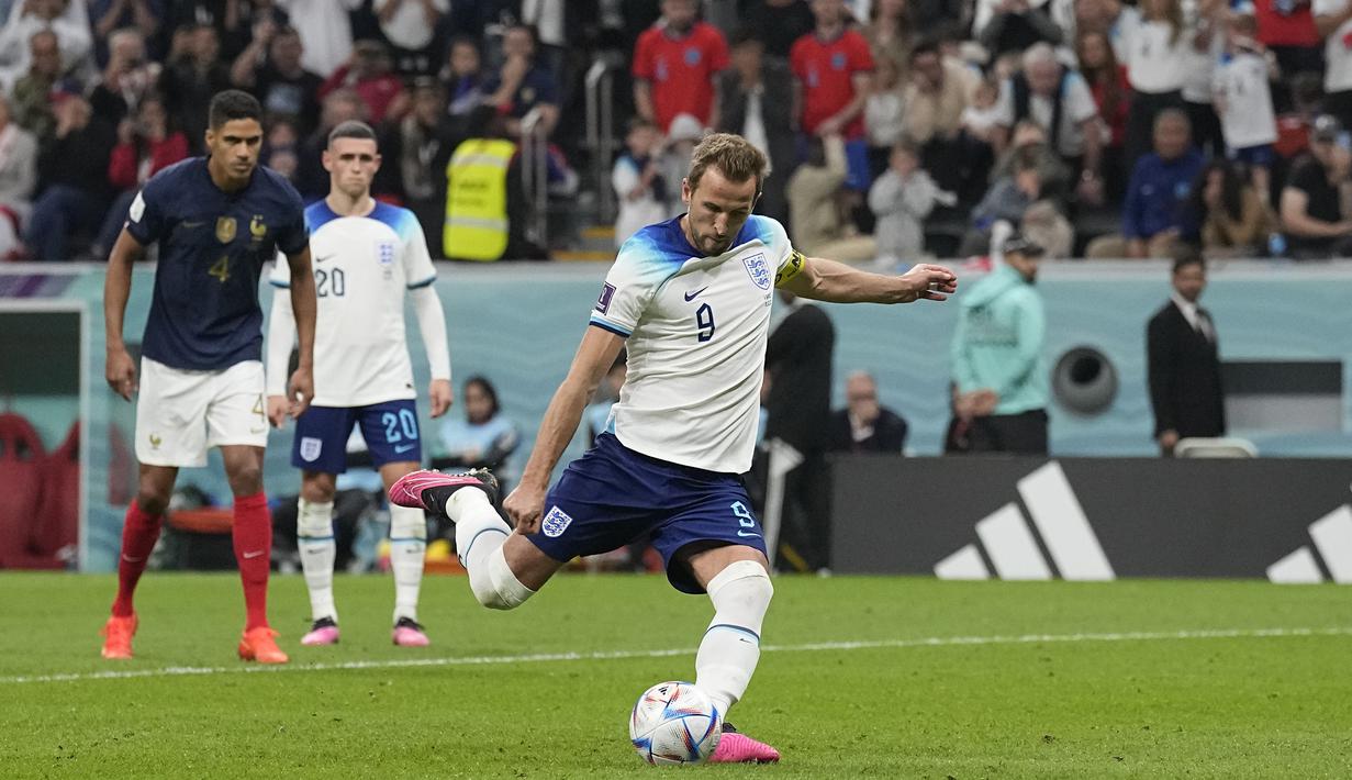 Eksekusi penalti yang diambil Harry Kane berbuah gol dan mengubah skor menjadi 1-1. (AP/Abbie Parr)