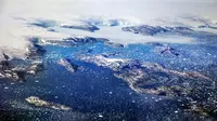 Gunung Es Seukuran 54 Lapangan Sepak Bola Hanyut di Greenland