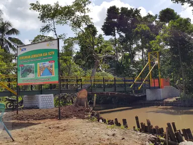Lokasi Jembatan Asa ke-7 yang berada Desa Sukaraja, Kecamatan Palas, Kabupaten Kalianda, Lampung Selatan, Minggu (13/3). Peresmian dilakukan oleh GM Planning Schedulling and Research Development SCTV, Doni Arianto. (Liputan6.com/dok SCTV)
