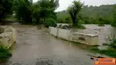 
Citizen6, Kilo: Banjir di jalan Kore-Kiwu, Kecamatan Kilo, Kabupaten Dompu Nusa Tenggara, telah meluap sampai kebadan ruas jalan. (Pengirim: Aji)