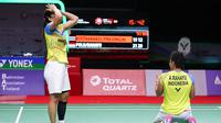 Ganda Putri Indonesia, Greysia Polii/Apriyani Rahayu, melakukan selebrasi usai menaklukkan wakil Thailand, Jongkolphan Kititharakul/Rawinda Prajongjai, pada laga Thailand Terbuka, Minggu (17/01/2021). Greysia/Apriyani mengalahkan pasangan tuan rumah dengan skor 21-15, 21-12. (AFP/BADMINTON ASSOCIATI
