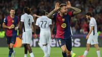 Gol Inigo Martinez pada menit ke-37 semakin memperkokoh keunggulan Barcelona. (LLUIS GENE/AFP)