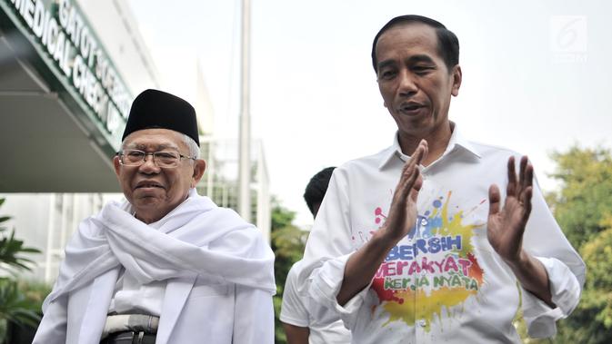 Pasangan bakal calon presiden dan wakil presiden Joko Widodo atau Jokowi (kanan) dan KH Ma'ruf Amin (kiri) saat tiba di RSPAD Gatot Subroto, Jakarta, Minggu (12/8). Keduanya menjalani tes kesehatan jelang Pilpres 2019. (Merdeka.com/Iqbal Nugroho)