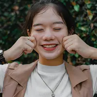 Mengenal arti istilah apple cheeks yang sedang viral di media sosial. (Pexels.com/Nothing Ahead)