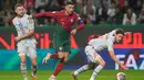 Portugal kembali memperpanjang catatan kemenangan pada laga Kualifikasi Euro 2024. Portugal mengalahkan Islandia dengan skor 2-0. (AP Photo/Armando Franca)