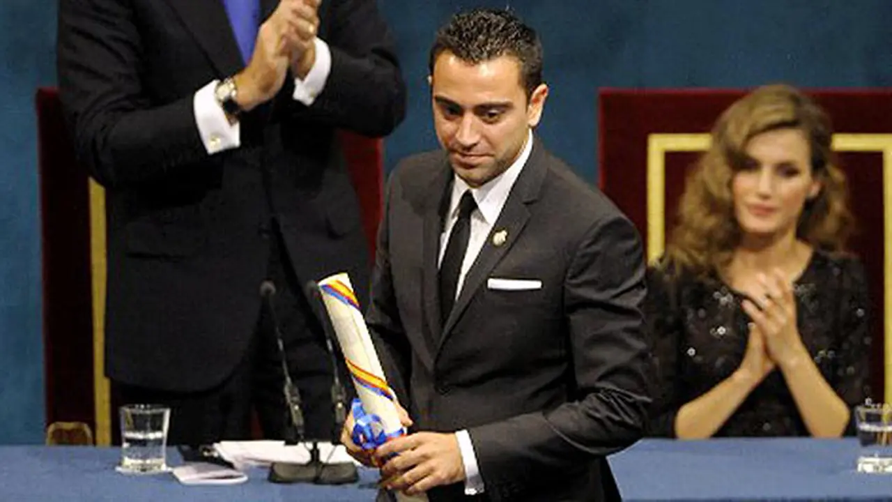 xavi-hernandez-121103-logo.jpg