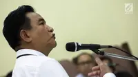 Yuzril Ihza Mahendra saat menjalani sidang ke-6 perkara Fiktif Positif di PTUN Jakarta, Rabu (24/5). Dalam perkara ini, belasan anggota DPD menggugat proses pengambilan sumpah Oesman Sapta, Nono Sampono, dan Darmayanti Lubis. (Liputan6.com/Faizal Fanani)
