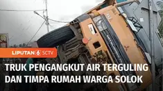 Tak kuat menanjak, truk pengangkut air mineral terguling dan menimpa rumah di jalan raya lintas nasional Gunung Talang, Kabupaten Solok, Sumatra Barat.