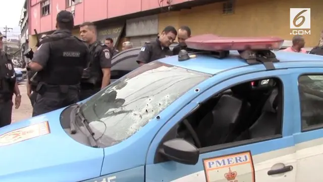 Baku tembak terjadi di jalan utama Rio de Janeiro menyebabkan 2 polisi terluka.