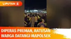 Ratusan warga mendatangi Mapolsek Seputih Surabaya, Lampung Tengah. Mereka menuntut polisi segera menangkap empat preman yang memeras warga dan melukai seorang tentara dari Koramil 411/09 Seputih Surabaya, Serda Rohmadi.