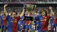 Kenangan Xavi Hernandez sangat mengangkat trofi Liga Champions (JOSEP LAGO / AFP)