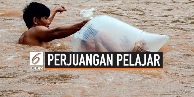 VIDEO: Pelajar SD Vietnam Dibungkus Plastik Demi Pergi Sekolah