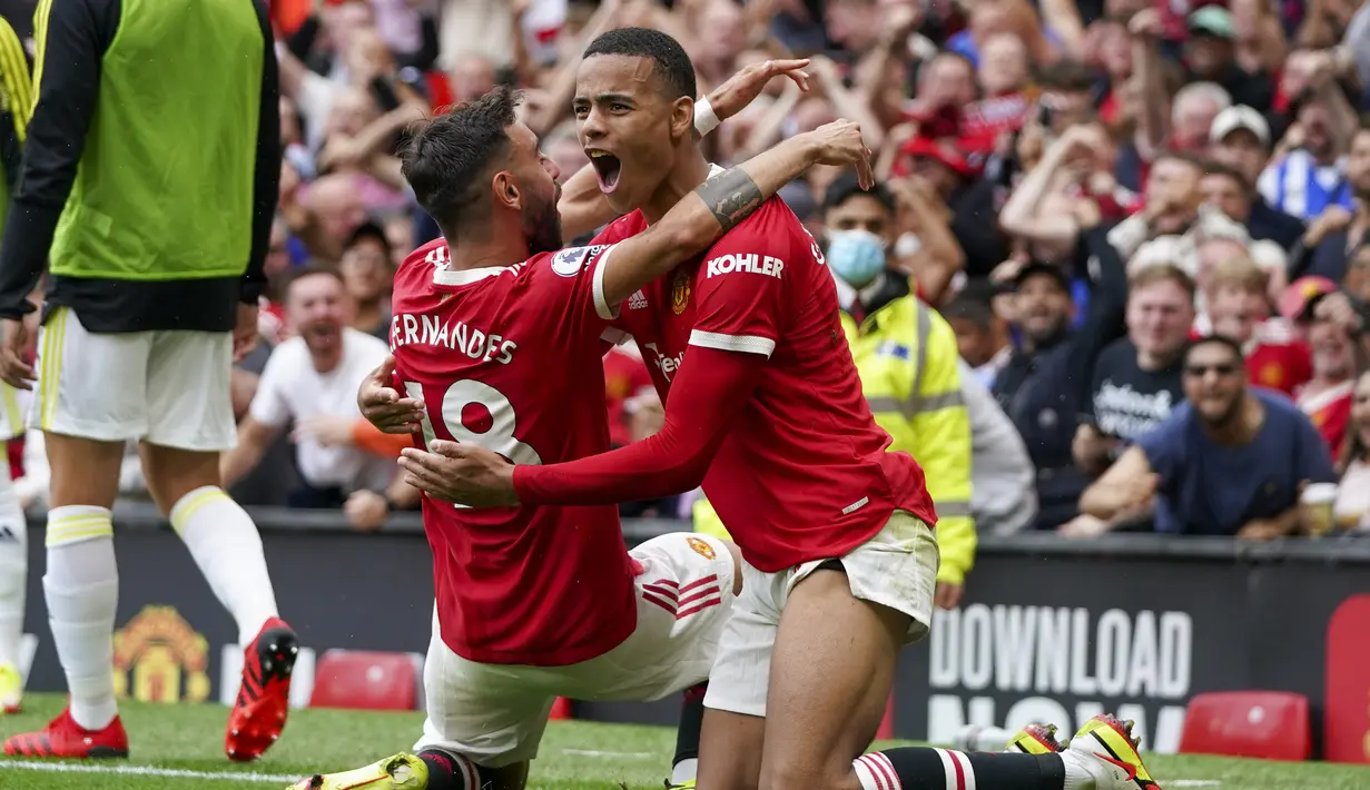 Mason Greenwood. Striker berusia 19 tahun ini merupakan produk asli Akademi Manchester United. Ia telah memperkuat Setan Merah sejak 2018/2019 dan telah tampil dalam 108 laga di semua kompetisi dengan mencetak 32 gol, termasuk dua gol di dua laga awal Premier League musim ini. (Foto: AP/Jon Super)