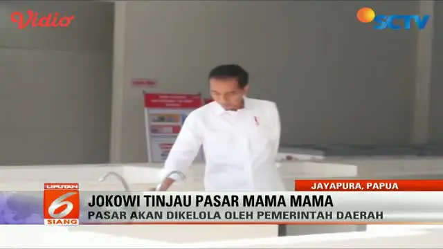 Jokowi meninjau langsung Pasar Mama Mama, yang terdiri dari bangunan dengan empat lantai di Jayapura, Papua.