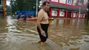 Pusat banjir bergeser ke provinsi tetangga Hebei pada hari Rabu. (Jade Gao / AFP)