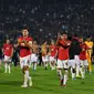 Harry Maguire dan para pemain Manchester United saat menghadapi Partizan Beograd pada lanjutan Liga Europa di stadion Partizana, Jumat (25/10/2019) dini hari WIB. (AFP/Andrej Isakovic)