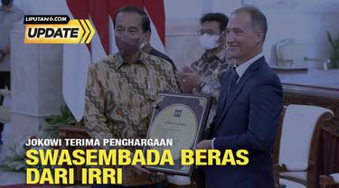 Presiden Joko Widodo menerima penghargaan Certificate of Acknowledgement dari Institut Penelitian Padi Internasional (IRRI) atas keberhasilan Indonesia dalam mencapai swasembada beras.