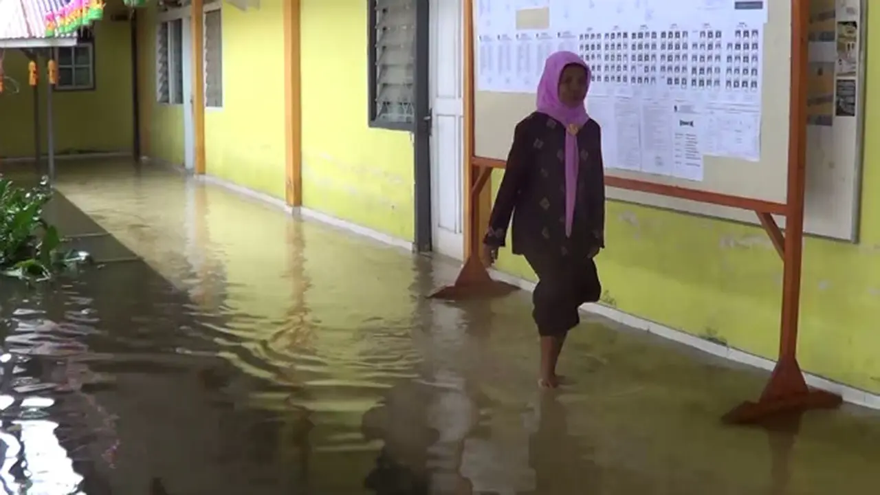 Cerita Guru SMP 7 kota Gorontalo Tetap Jalani UNBK Saat Banjir
