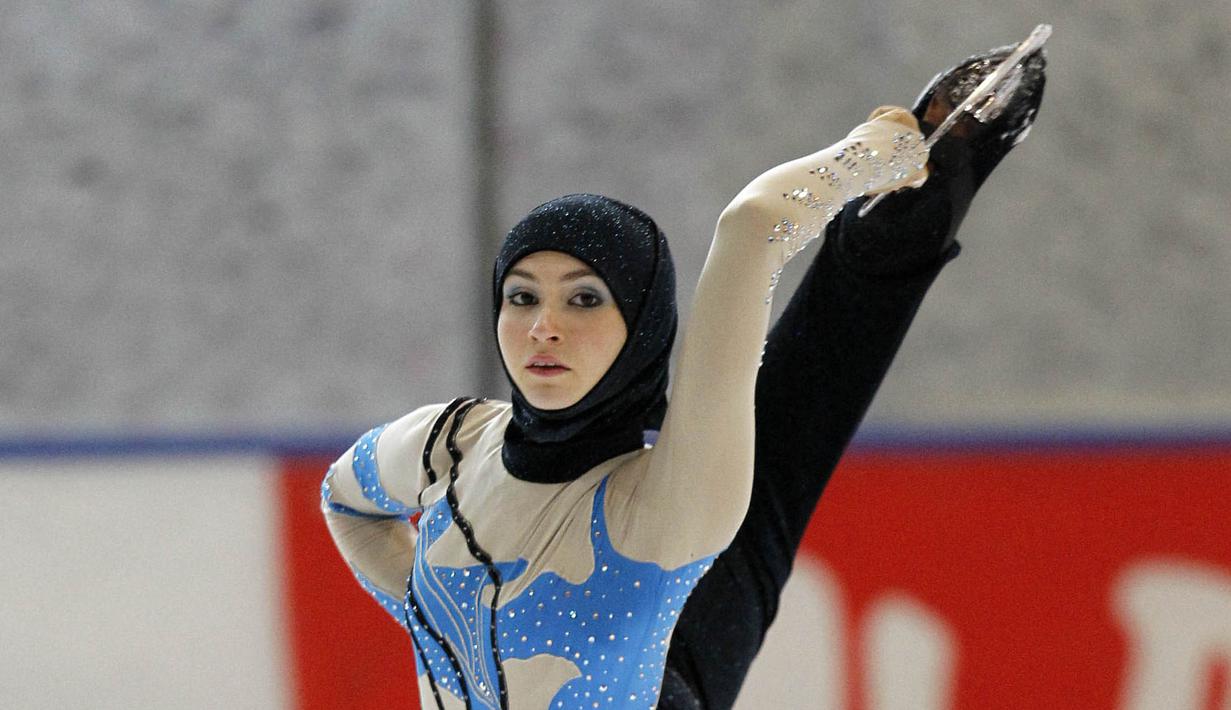 Namun, Zahra tetap pada kesetiaannya dan tetap tampil menarik dengan mengenakan hijab. Kemampuannya yang memukai, Zahra tak jarang berhasil meraih prestasi besar di tingkat internasional. (Foto: AFP/Andrea Solero)