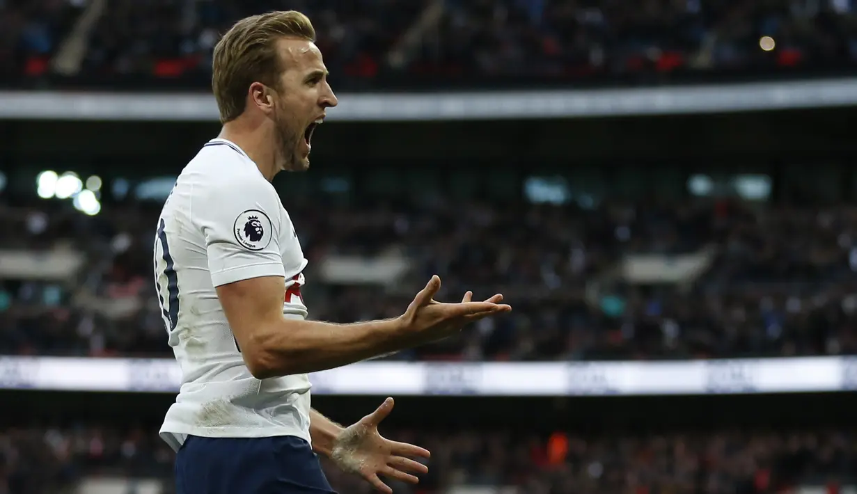Penyerang Tottenham Hotspur, Harry Kane menjadi salah satu pemain dalam daftar belanja yang disusun presiden Real Madrid, Florentino Pérez. (AFP/IKIMAGES/Ian Kington)