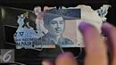 Kondisi uang rusak yang ditukarkan warga di Bank Indonesia, Jakarta, Senin (6/6). BI meminta masyarakat menukarkan uang yang sudah tidak layak edar dengan uang baru agar uang yang beredar tetap berkualitas tinggi. (Liputan6.com/Immanue Antonius)