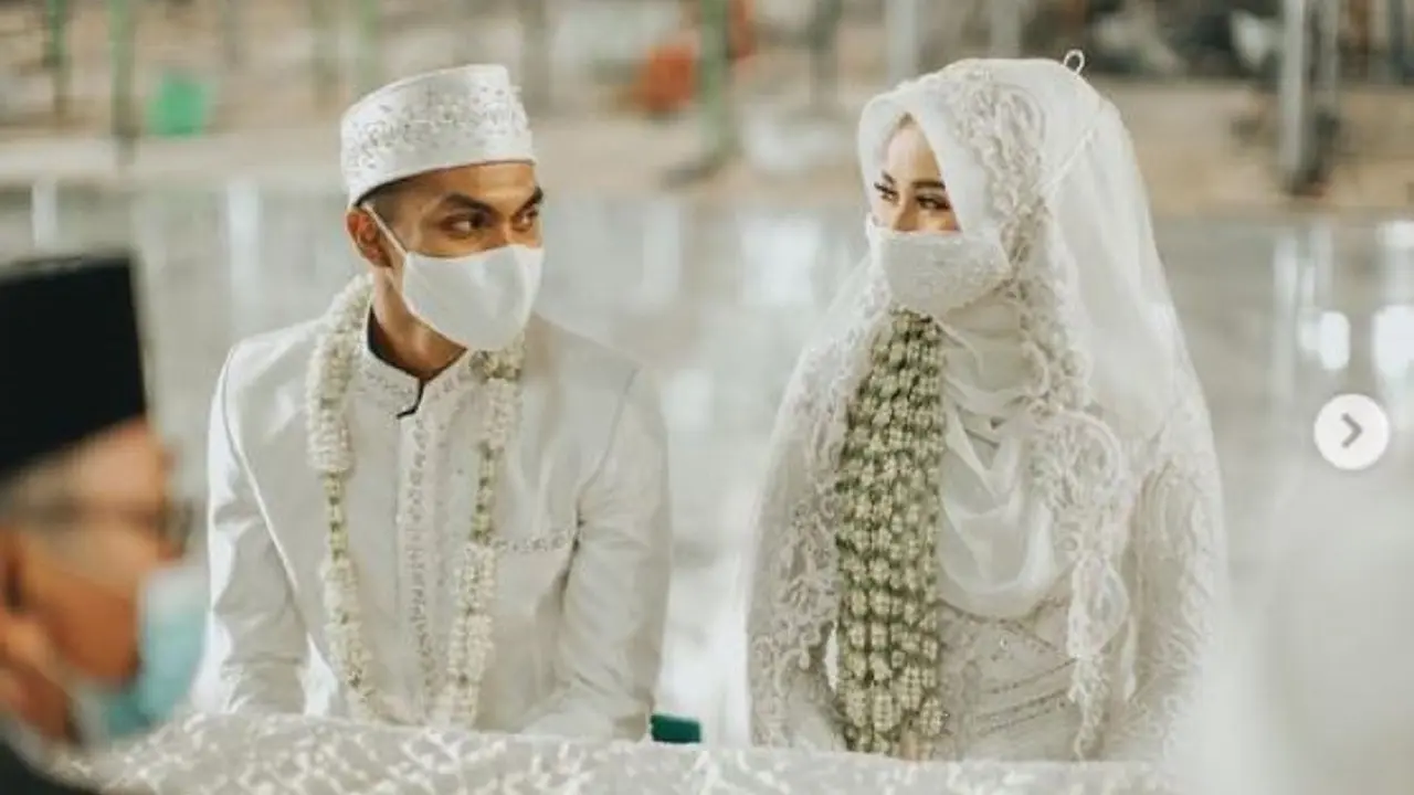 Rachmat Irianto dan Siti Qonita