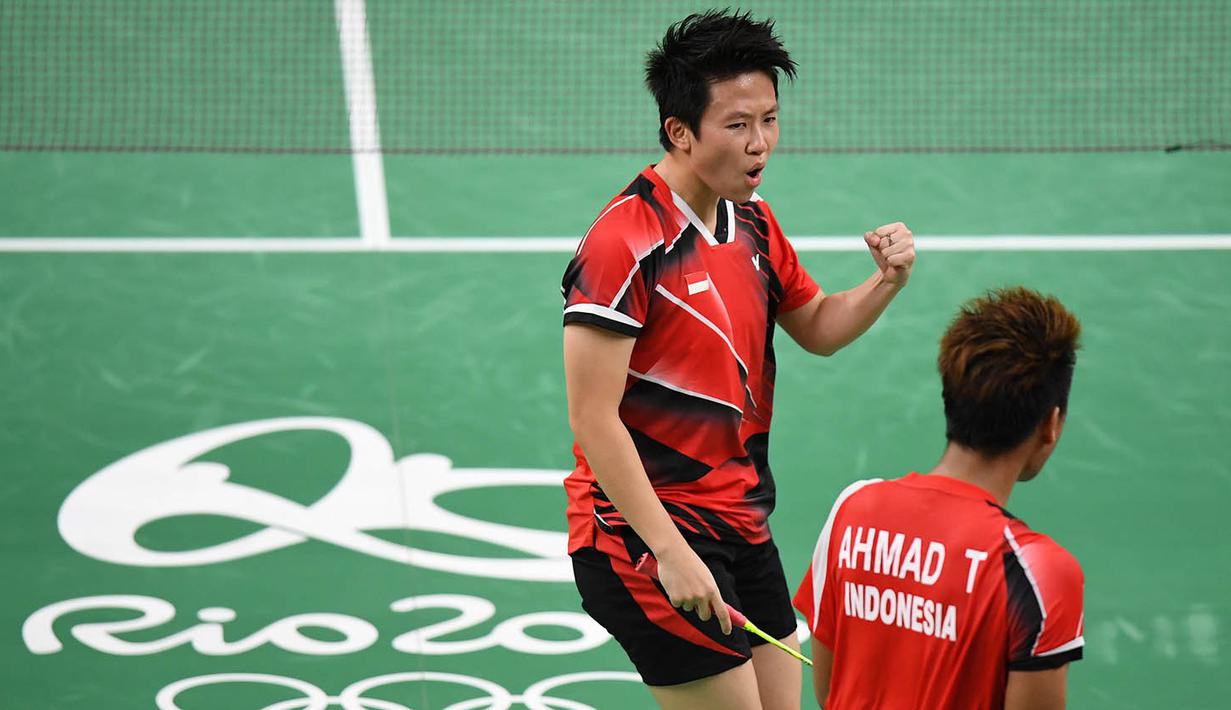 Pada final, Tontowi Ahmad/Liliyana Natsir akan bertemu pasangan Malaysia, Chan Peng Soon/Goh Liu Ying. (AFP/Jim Watson)