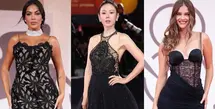 Kaia Gerber membuktikan dirinya sebagai ikon Old Hollywood yang sesungguhnya. Hadir bersama sang kekasih Lewis Pullman pada 1 September, model sekaligus aktris ini mencuri perhatian dalam gaun sheer lace Givenchy yang anggun sekaligus menggoda. [@vogueitalia].